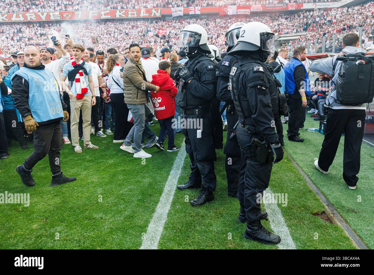 Police Deploy Horses as Fans Storm Pitch During Mannheim vs. Kaiserslautern Match Police Deploy Horses as Fans Storm Pitch During Mannheim vs. Kaiserslautern Match