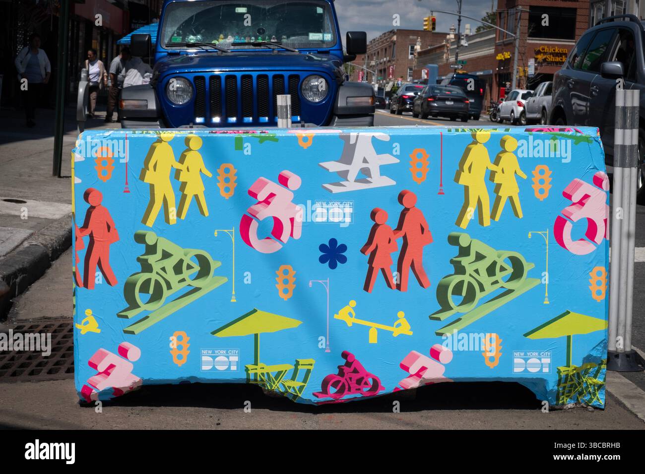 Colorful barricade covers sponsored by the city's MTA. On Broadway near Steinway Street in Astoria, Queens,  New York City, Stock Photo