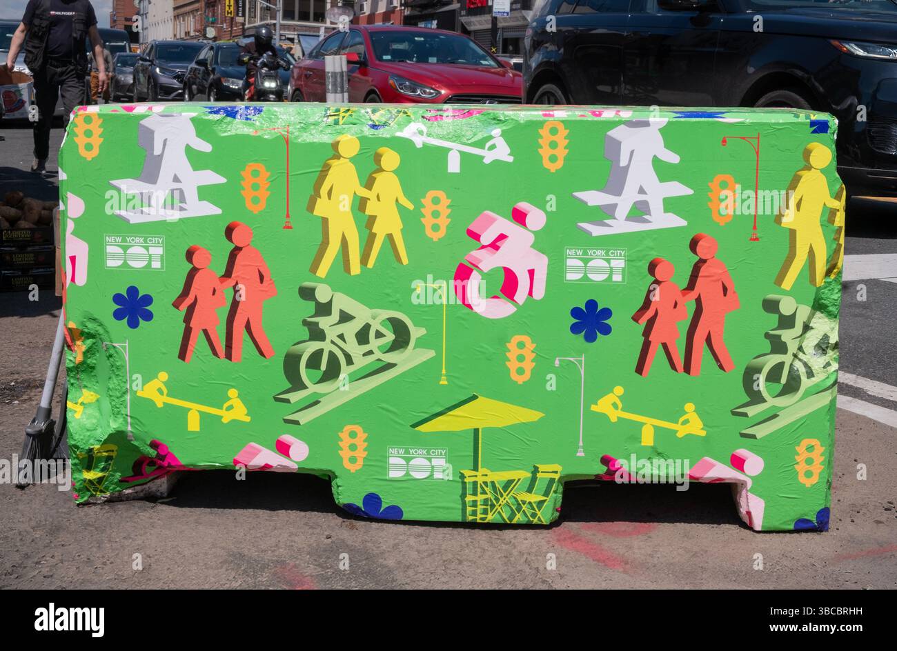 Colorful barricade covers sponsored by the city's MTA. On Broadway near Steinway Street in Astoria, Queens,  New York City, Stock Photo