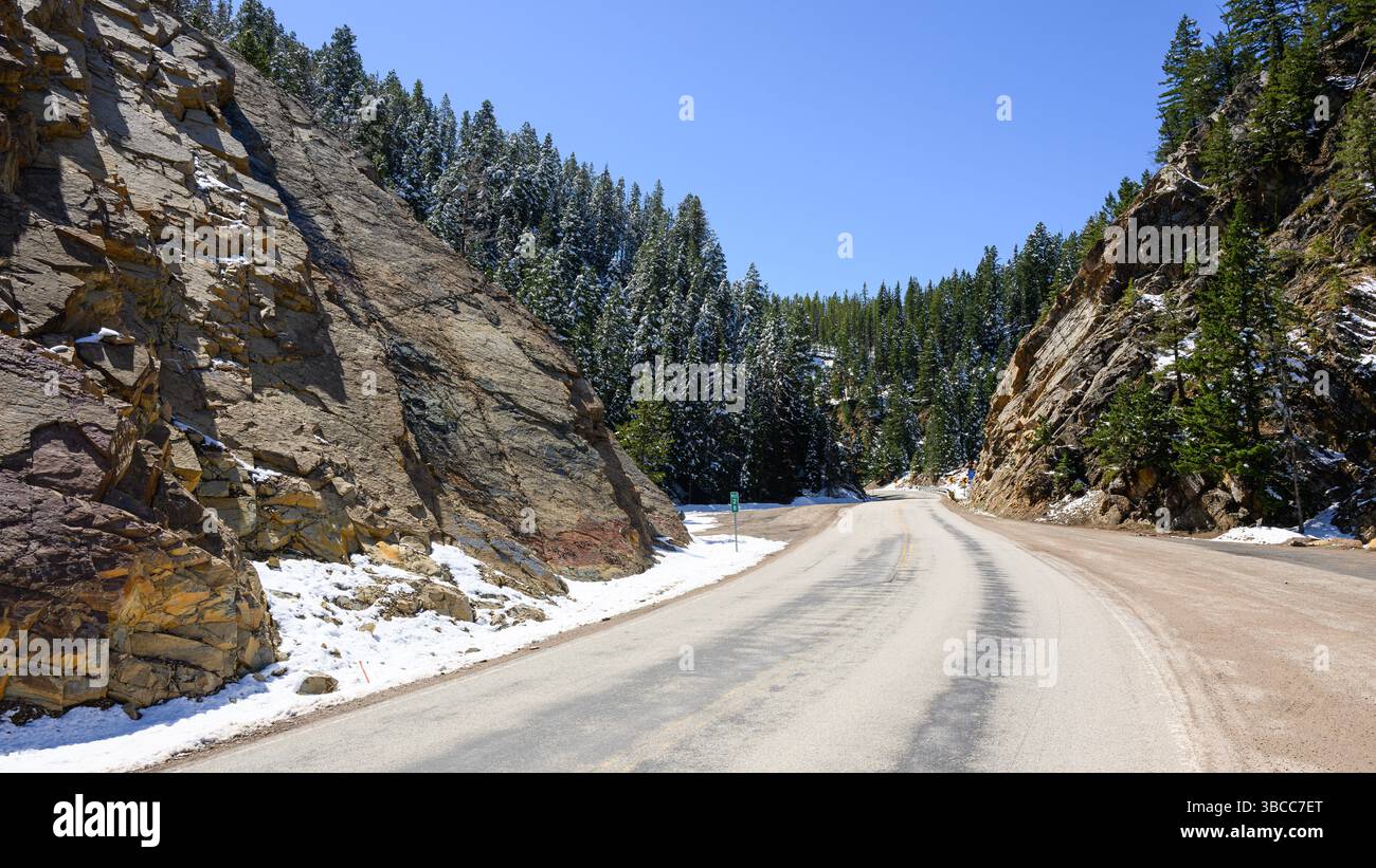 Springtime snow on Pintler Veterans Memorial Scenic Highway in mountains of Montana Stock Photo