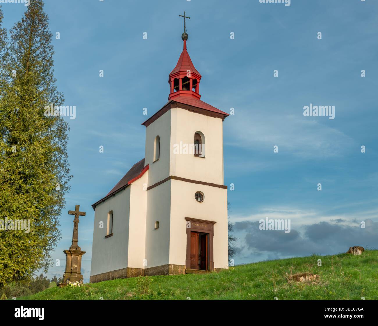Old chapel in golden hour evening in color spring after sunset in Cihak CZ 04 30 2025 Stock Photo