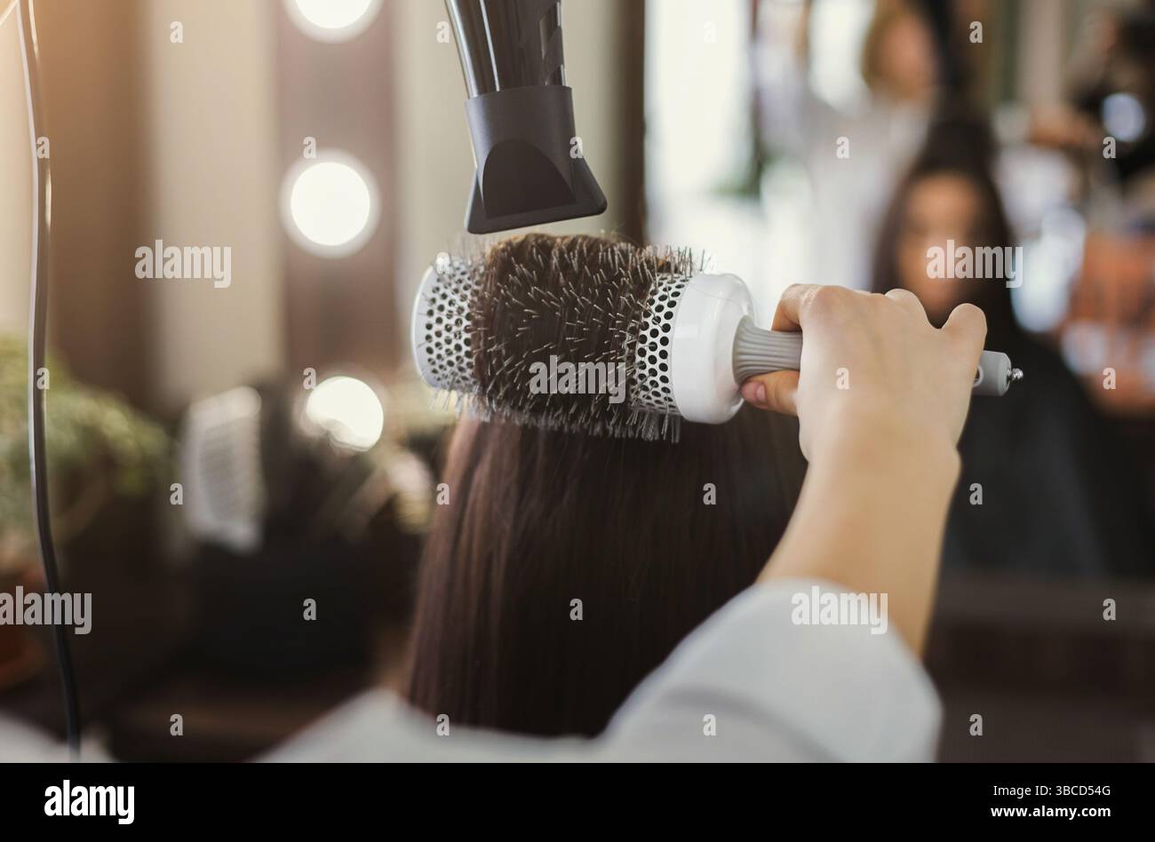 Blow drying hair brush hi-res stock photography and images - Alamy