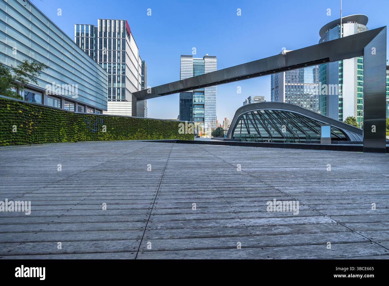 Empty wooden footpath front modern building Stock Photo - Alamy