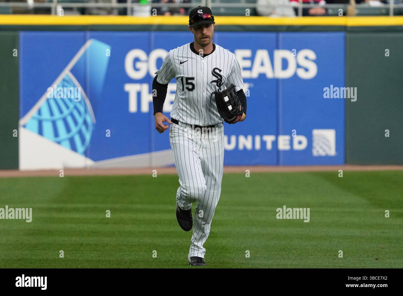 Chicago White Sox's Austin Slater runs back to the dugout during the ...
