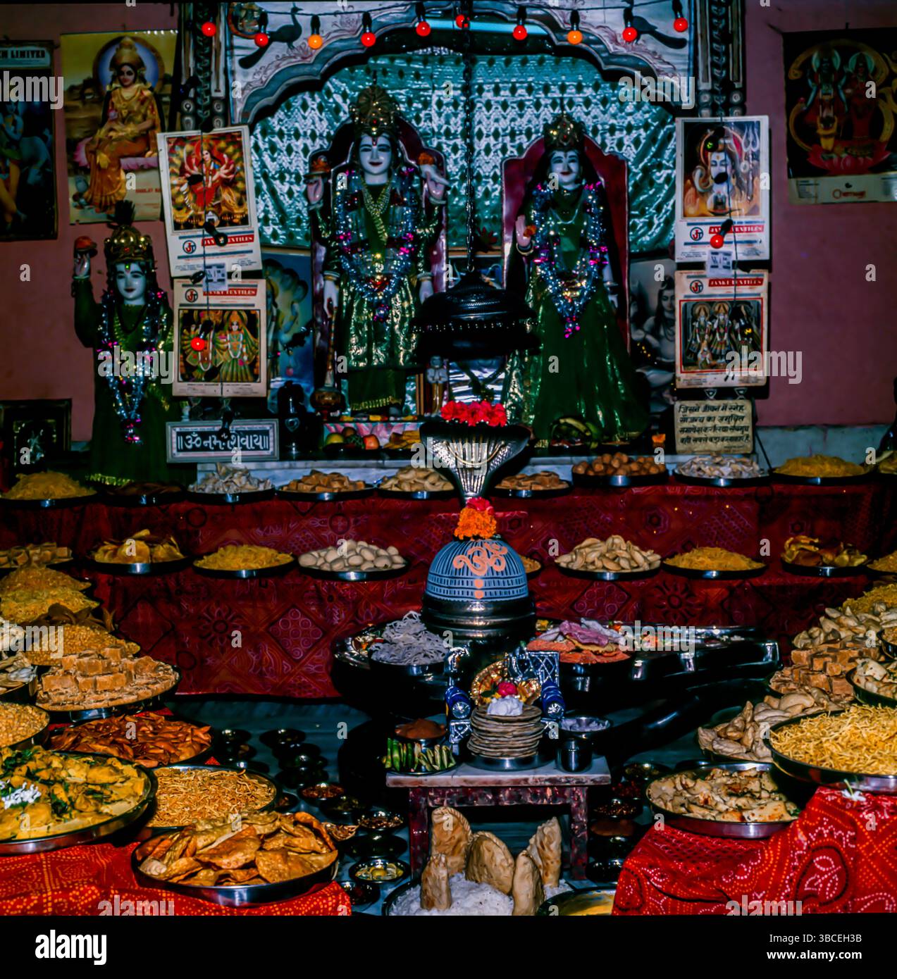 Shiv Shakti Idols with Chappan bhog (56 Varieties of Foods) in Temple. Stock Photo