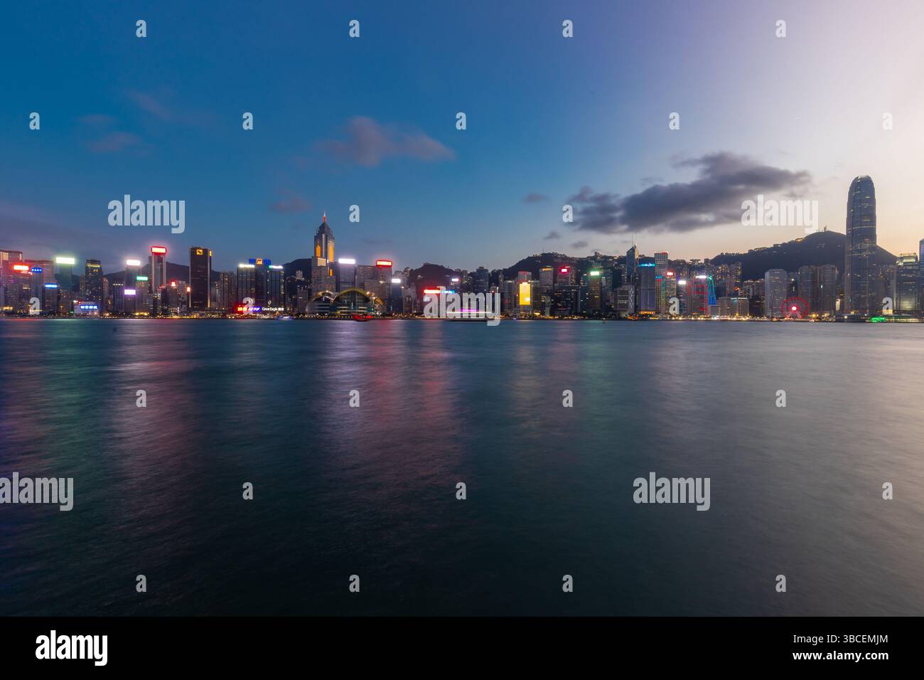 Sunset and evening view over the impressive skyline of Hong Kong Island ...