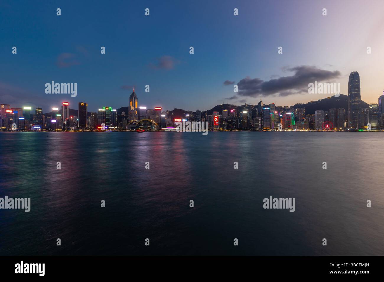 Sunset and evening view over the impressive skyline of Hong Kong Island ...