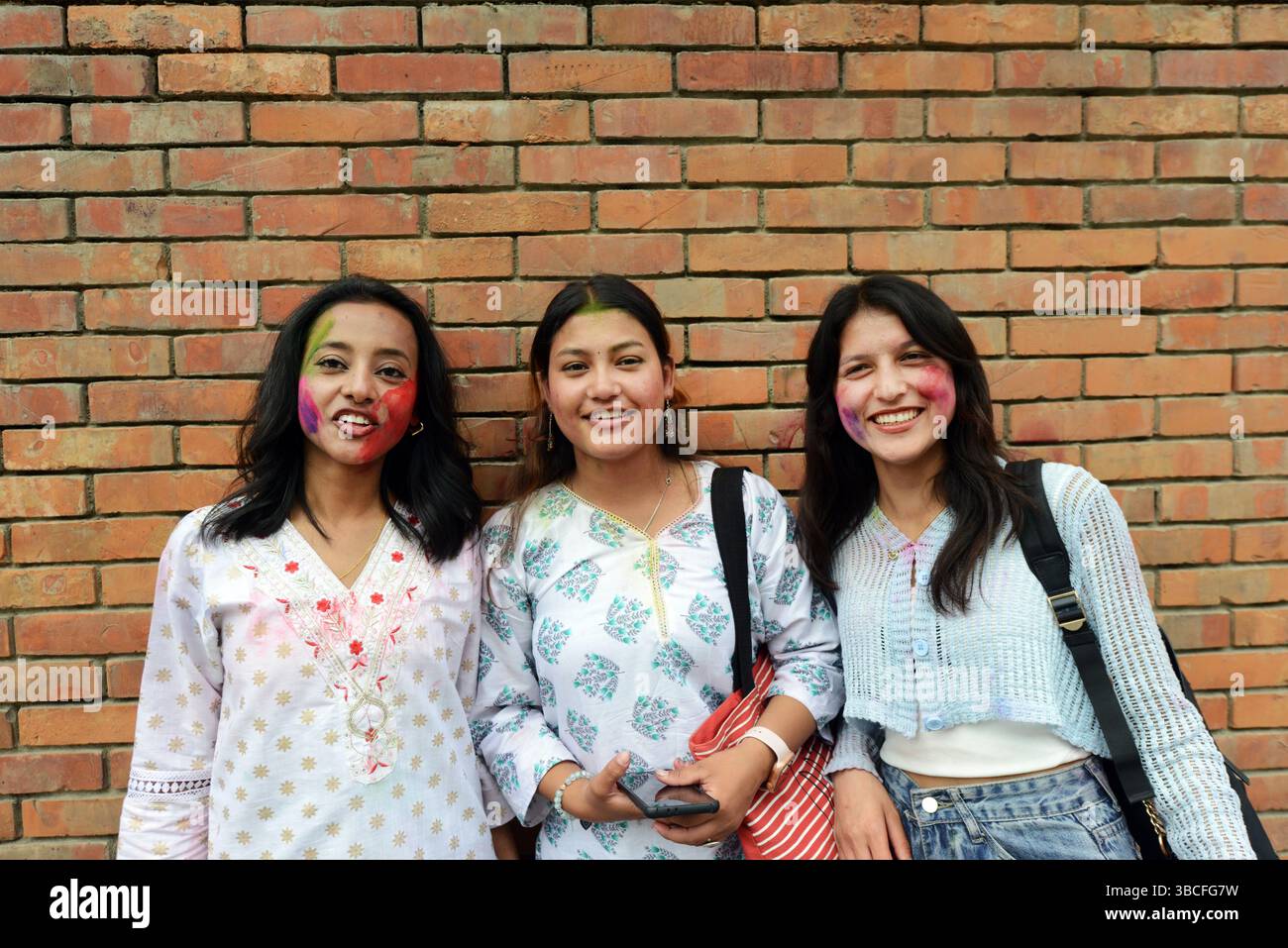 Portrait of Nepali teenagers taken during the Holi festival in Kathmandu, Nepal. Stock Photo