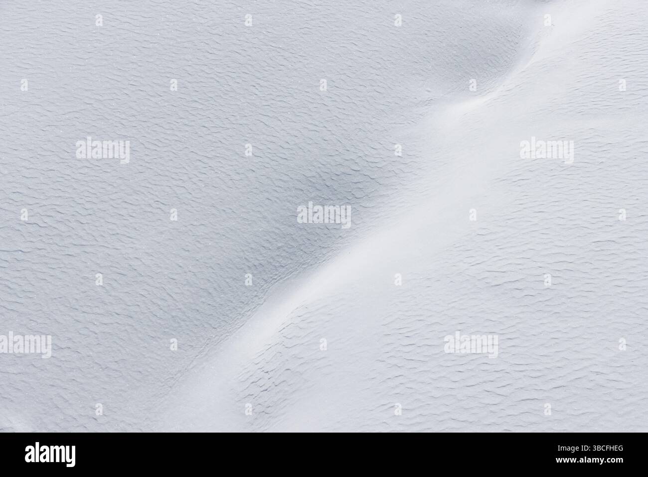 Bright white textured winter snow surface landscape Stock Photo