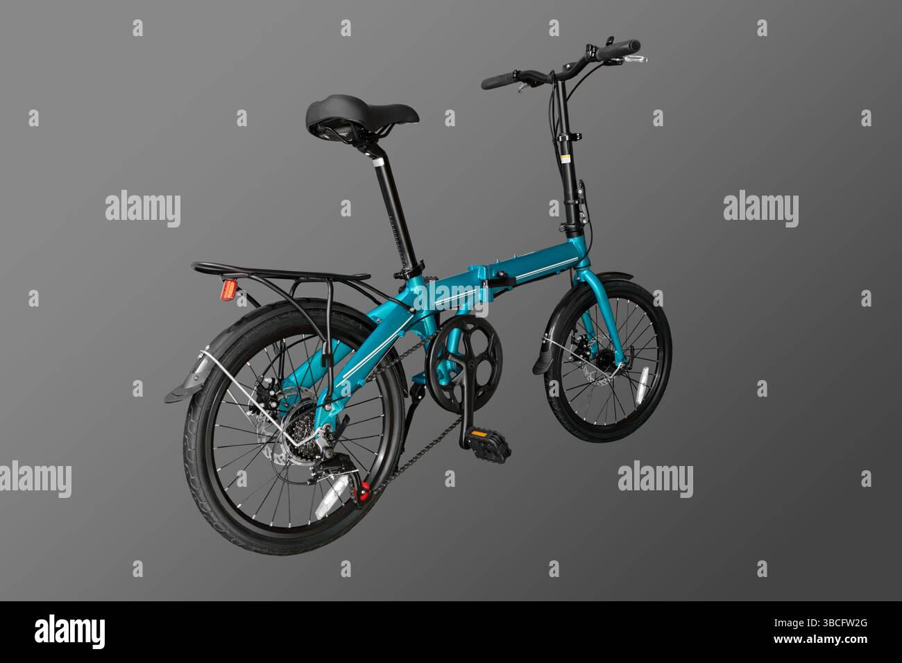 Folding compact bike. Close-up. Isolated on grey background. Stock Photo