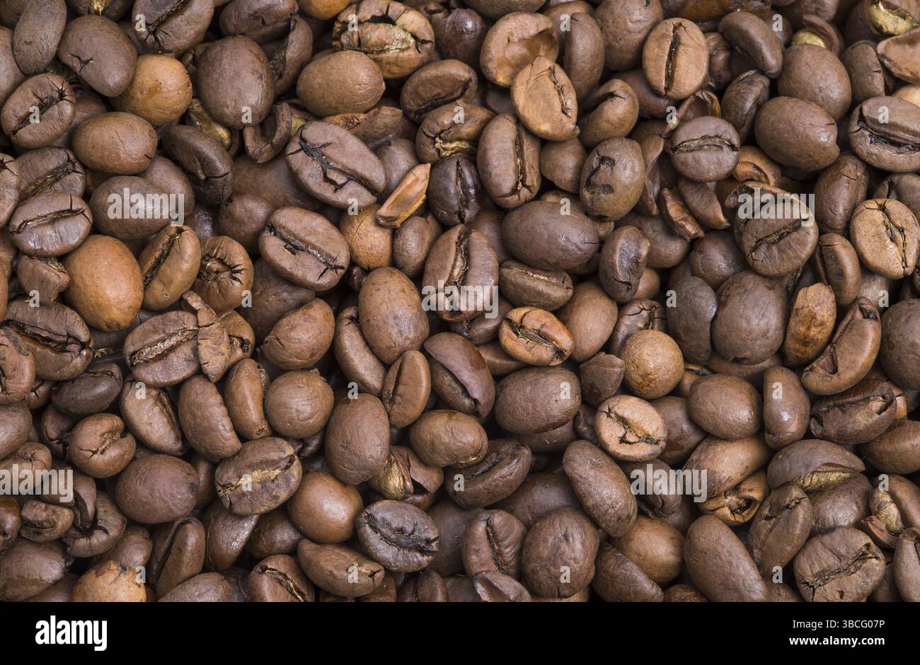 The photo shows a pile of roasted coffee beans Stock Photo - Alamy