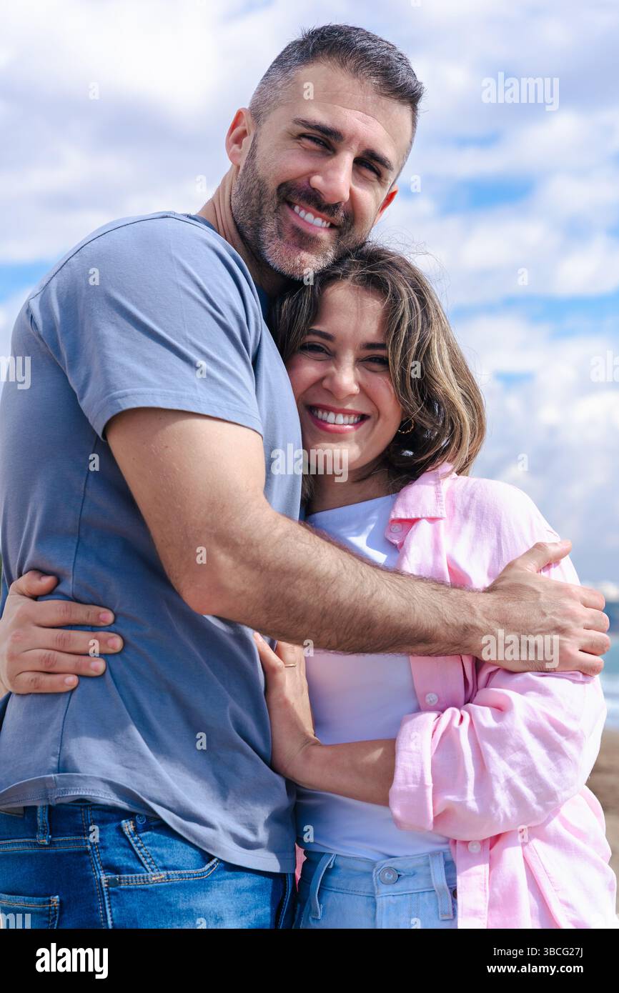 Affectionate couple beach hi-res stock photography and images - Alamy