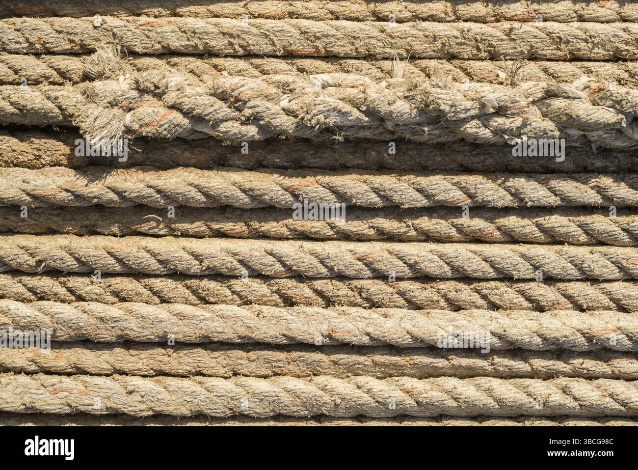 Natural rope made of fibre as background with splicing in foreground ...