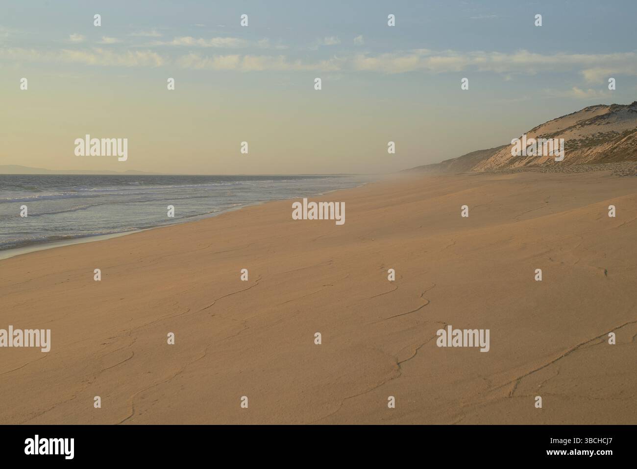 Serene empty beach gentle waves hi-res stock photography and images - Alamy
