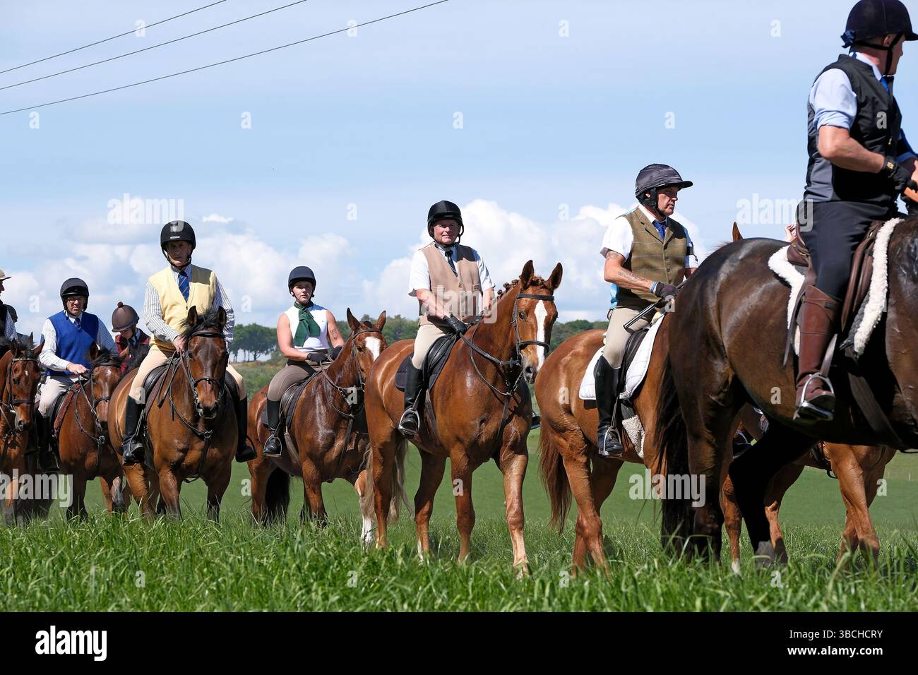 Hawick, UK. 20th May, 2025. Tuesday 20 May 2025 Hawick Common Riding 2025, Preisthaugh Rideout, Hawick, UK. Cornet, RH & LH lead 60 mounted supporters during another preliminary rideout in the lead up to the Common Riding on Friday 6th June 2025. Hawick Common Riding is the first of the annual Border events, it celebrates the capture of an English Flag from a raiding party in 1514 by the youth of Hawick at Hornshole and the ancient custom of riding the marches or boundaries of the common land. Credit: Rob Gray/Alamy Live News Stock Photo