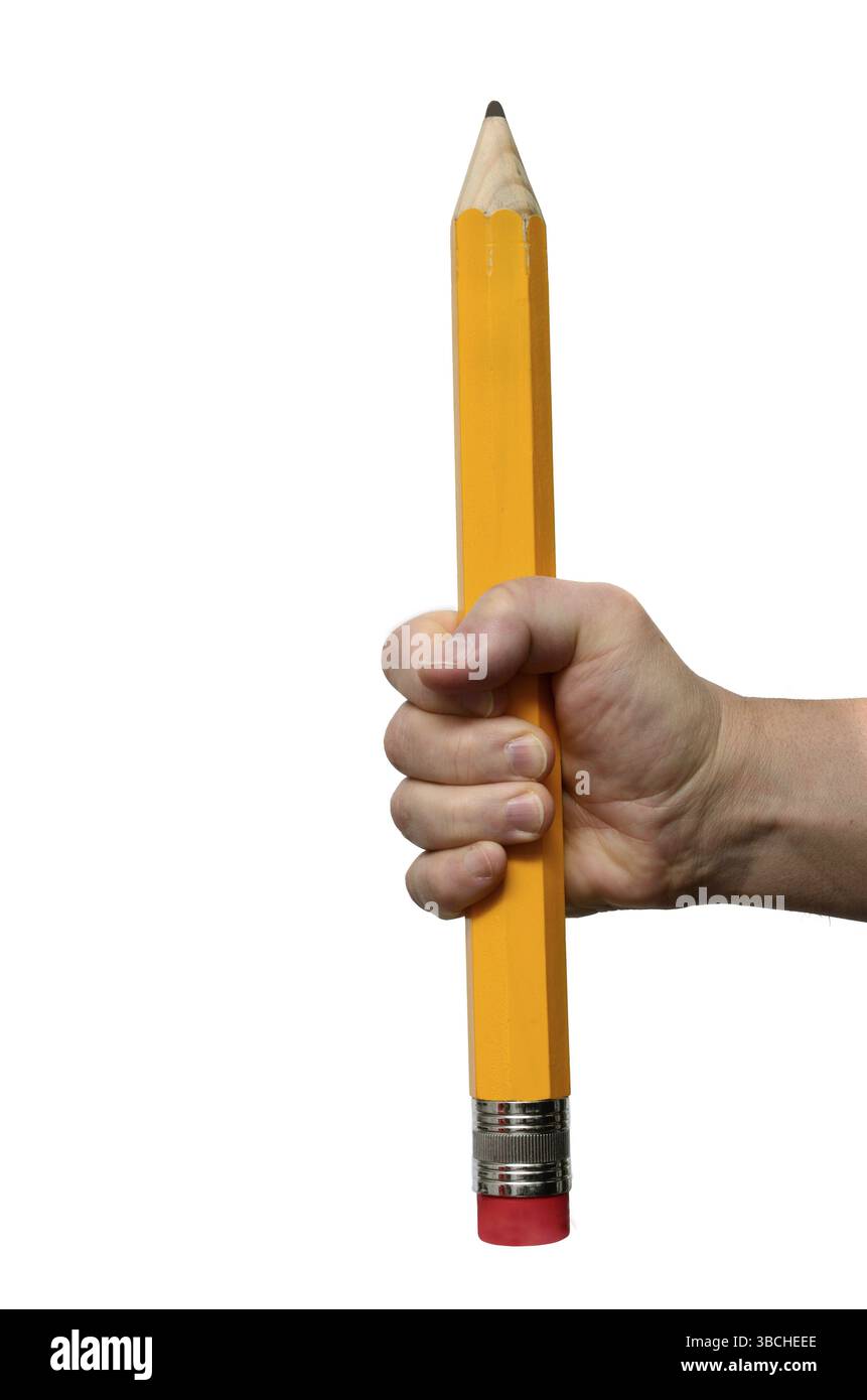 Big pencil in hand on a white background Stock Photo
