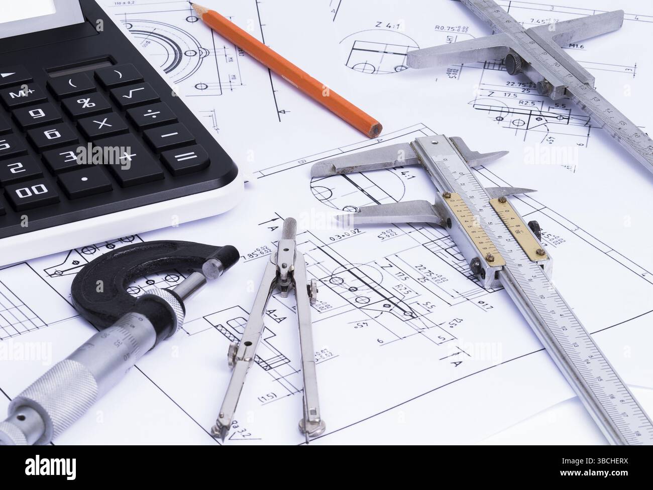 The photo shows various measuring devices on a technical drawing Stock ...