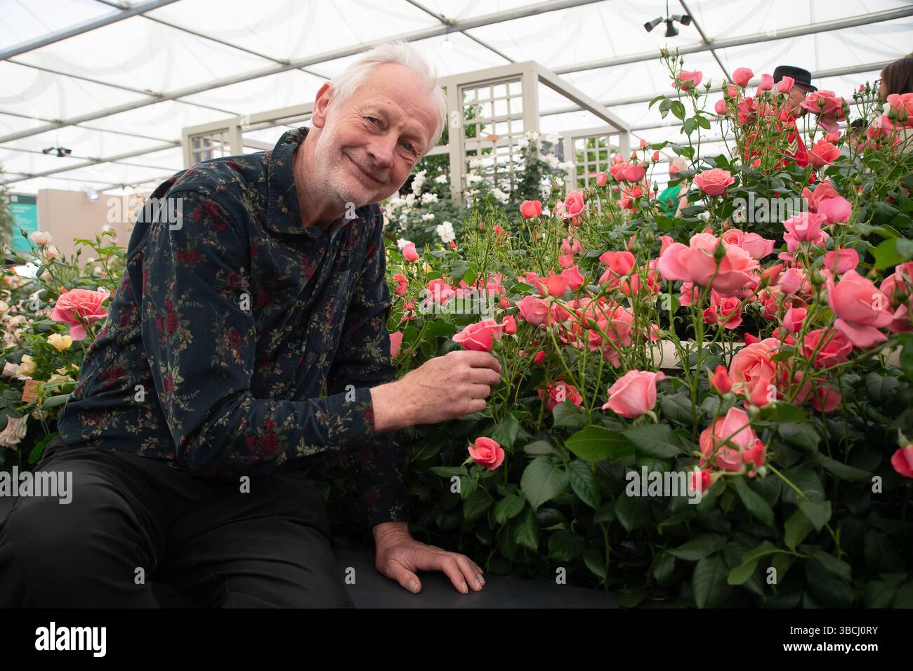 Chelsea, London, UK. 19th May, 2025. Rose grower Philip Harkness ...