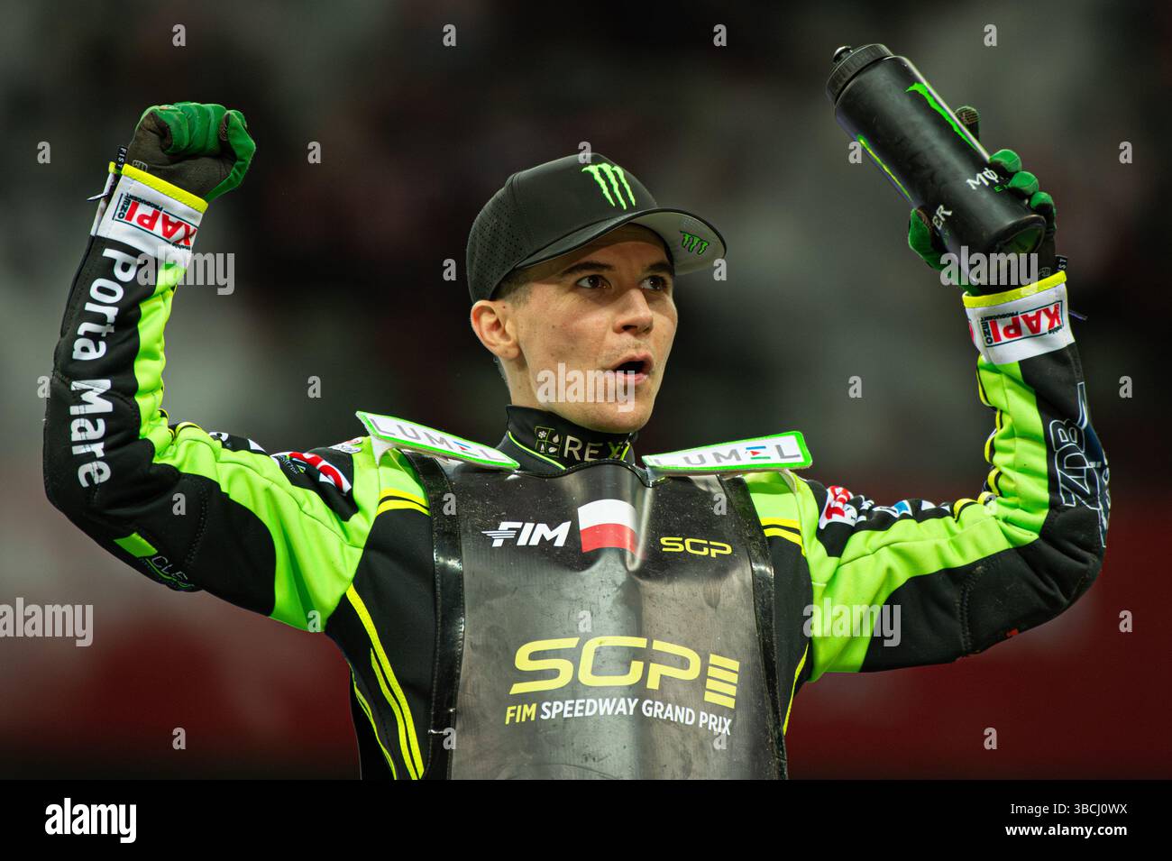 WARSZAWA, POLAND – MAY 17, 2025: Orlen Oil FIM Speedway Grand Prix of Poland in PGE Narodowy 2025. In photo Patryk Dudek celebrating third place. Stock Photo