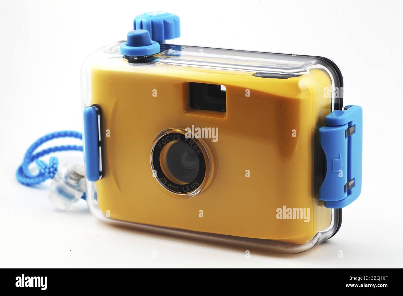 Yellow camera in waterproof box over white Stock Photo