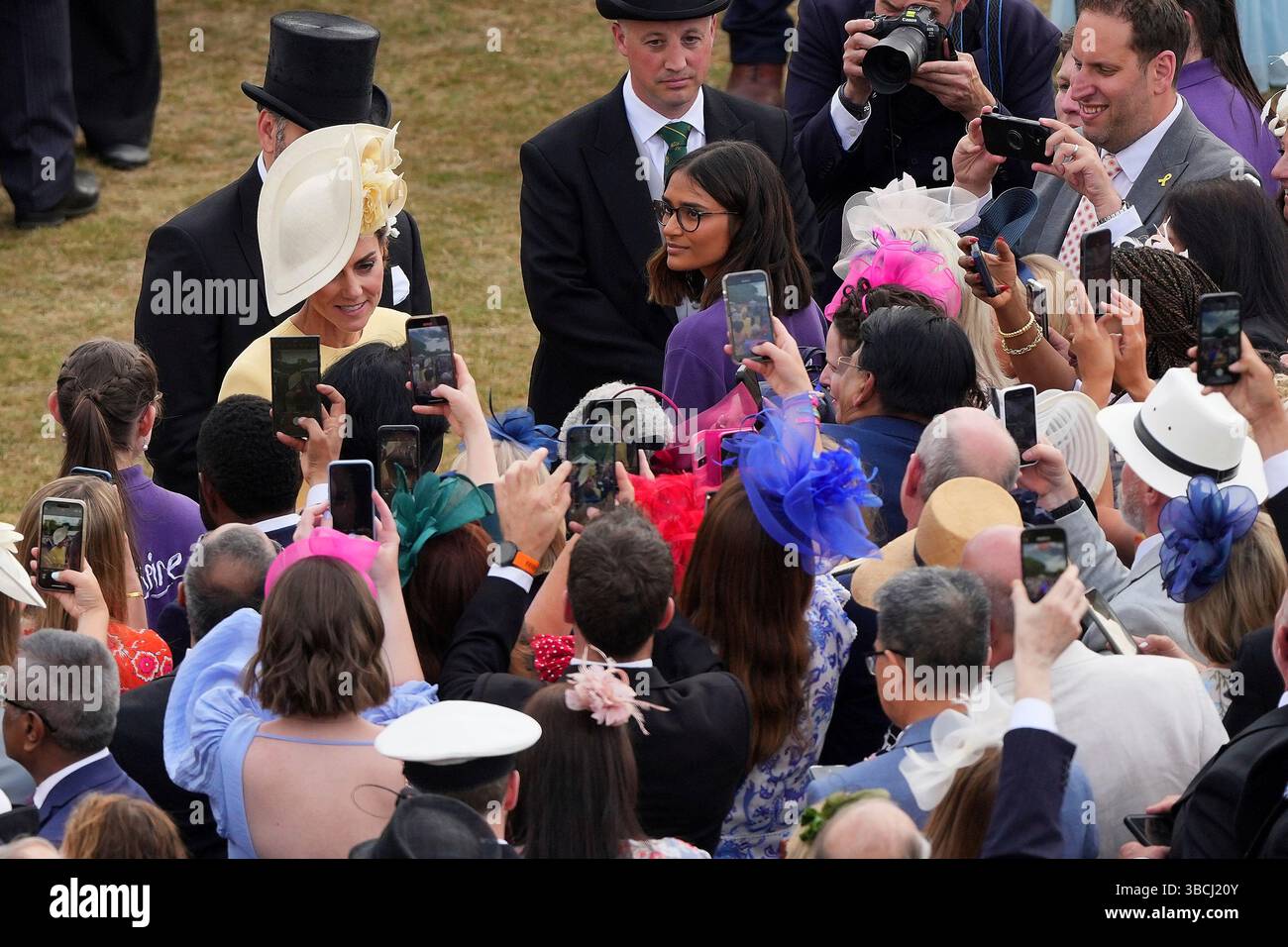Kate Tuesday Britain's Kate, the Princess of Wales, speaks to guests during a Royal ...