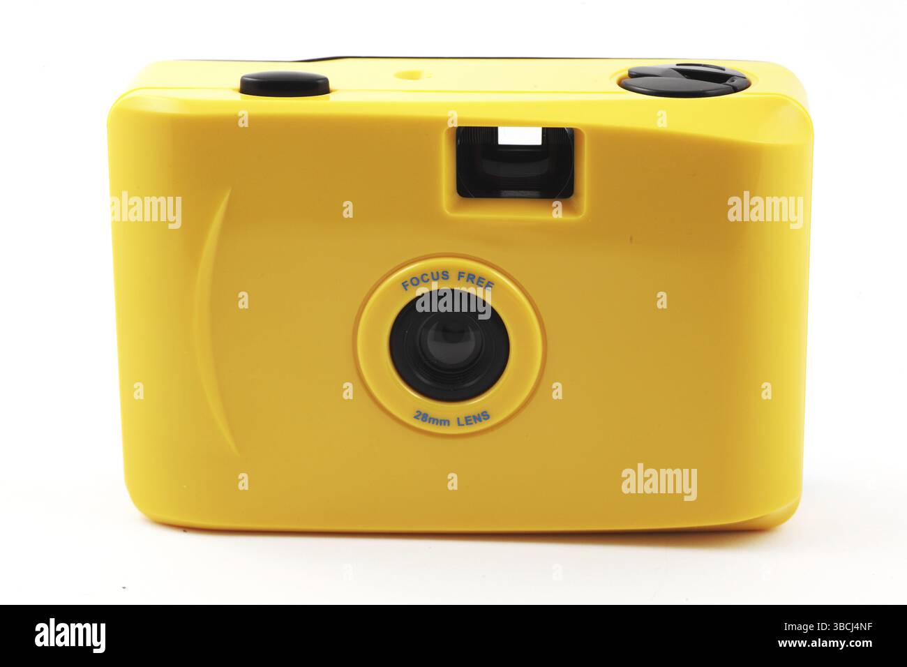 Yellow camera shoot and go over white Stock Photo
