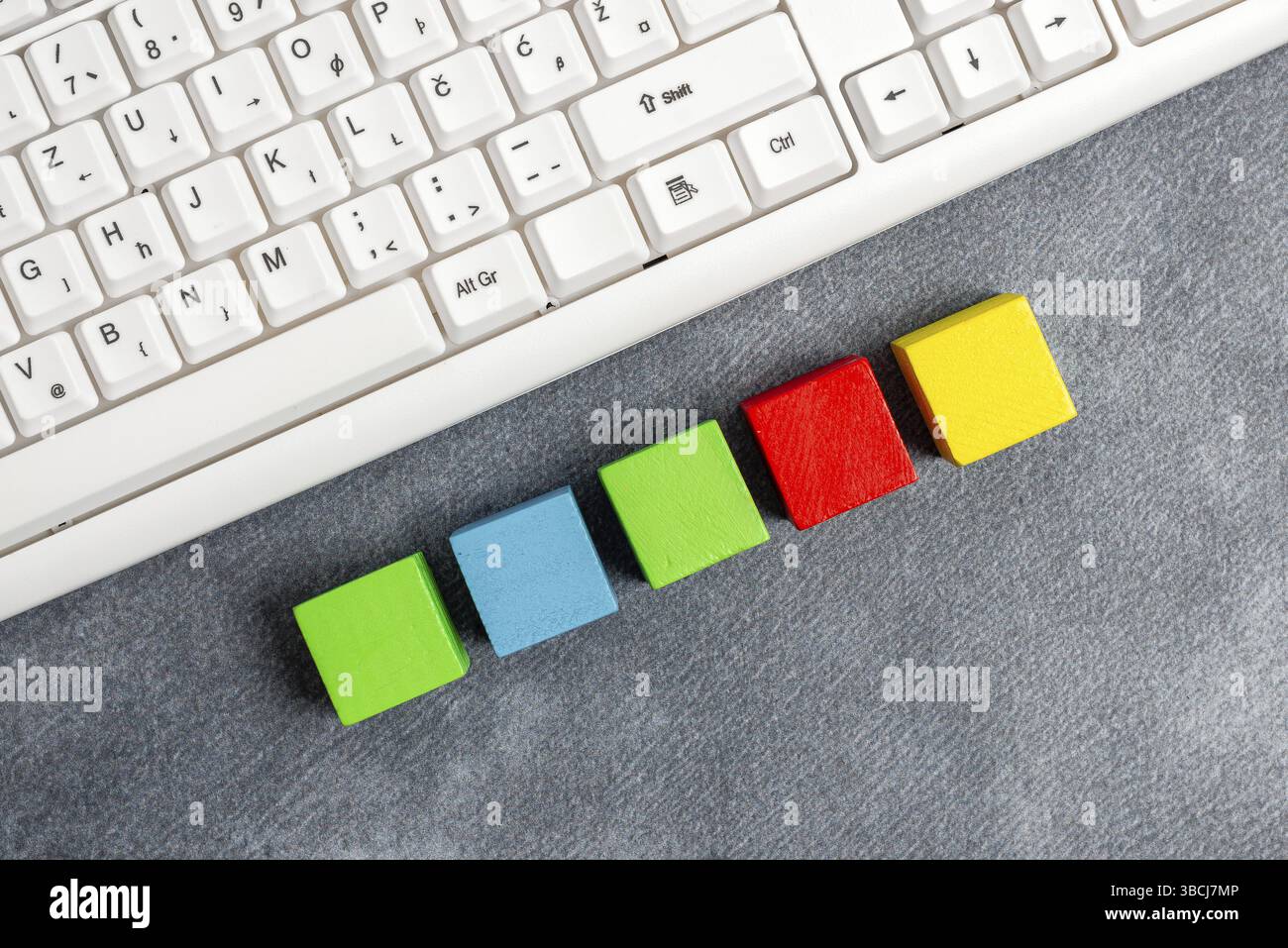 Stack of Sample Cube Rectangular Boxes On Surface Polished With Multi-Colour Stock Photo