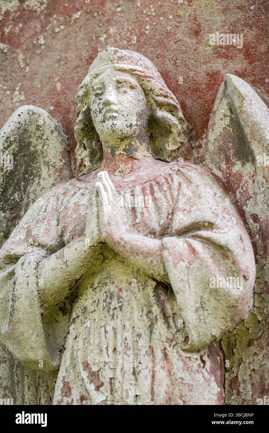 Old angel sculpture with peeling off paint. Unknown Artist of the 18th ...