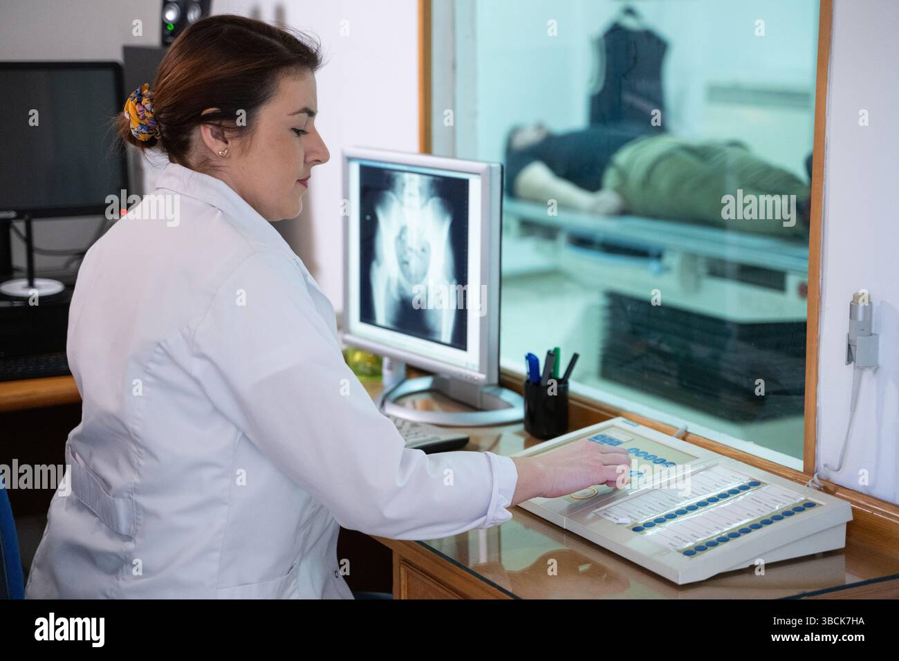 Radiologist Analyzing X-Ray Scans in a Medical Imaging Room Stock Photo ...