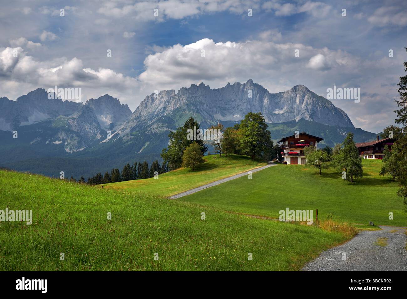 A rural picture with a panorama of the Kaisergebirge. Stock Photo