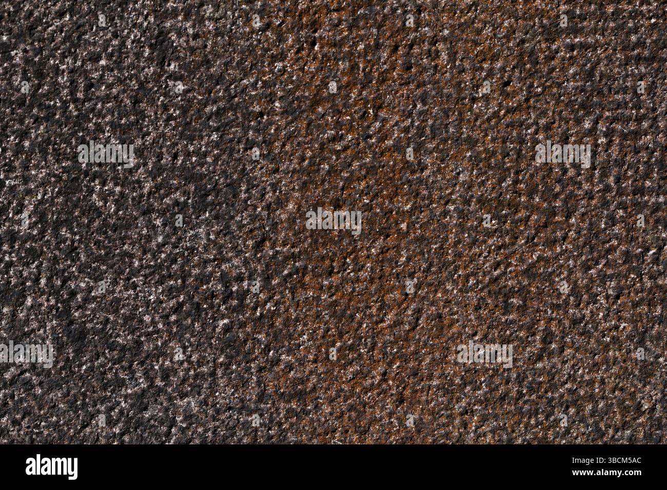 Hammered granite background in black and red Stock Photo