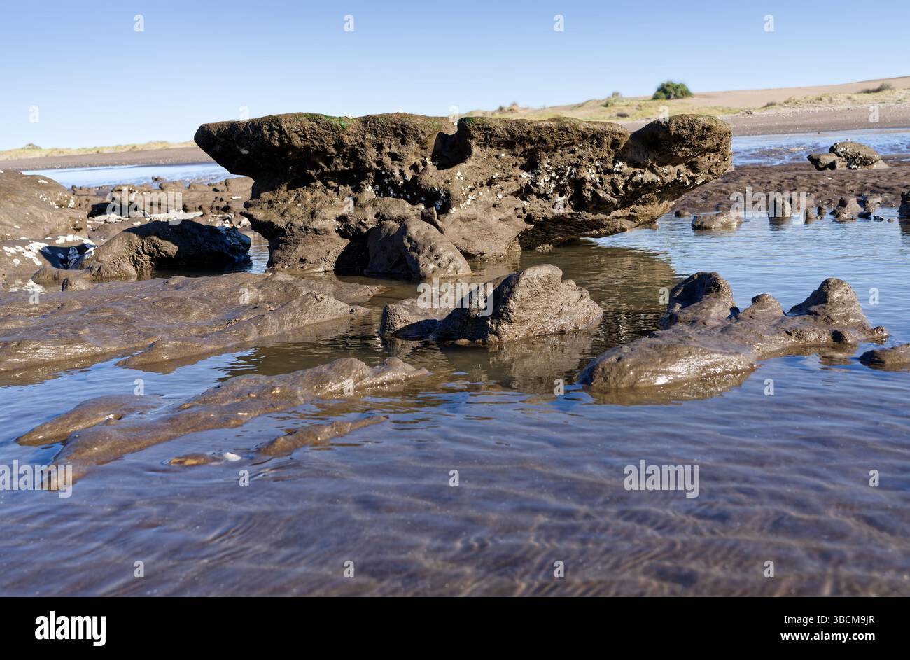 Dark brown eroded rocks hi-res stock photography and images - Alamy