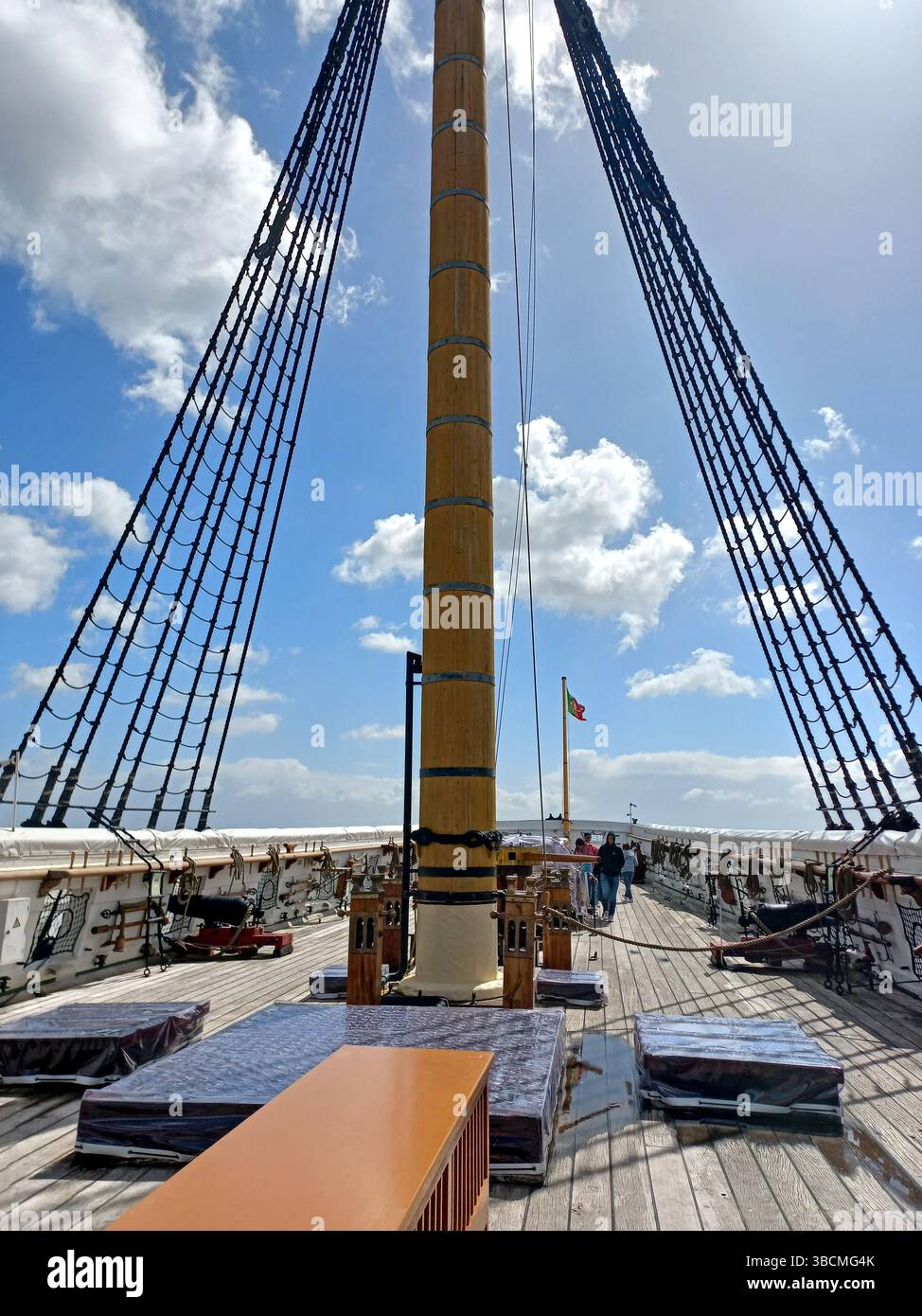 Lisbon Portugal April 19 2025 View of Dom Fernando II e Gloria frigate displayed in dry dock showing masts wooden hull and cannon deck Stock Photo