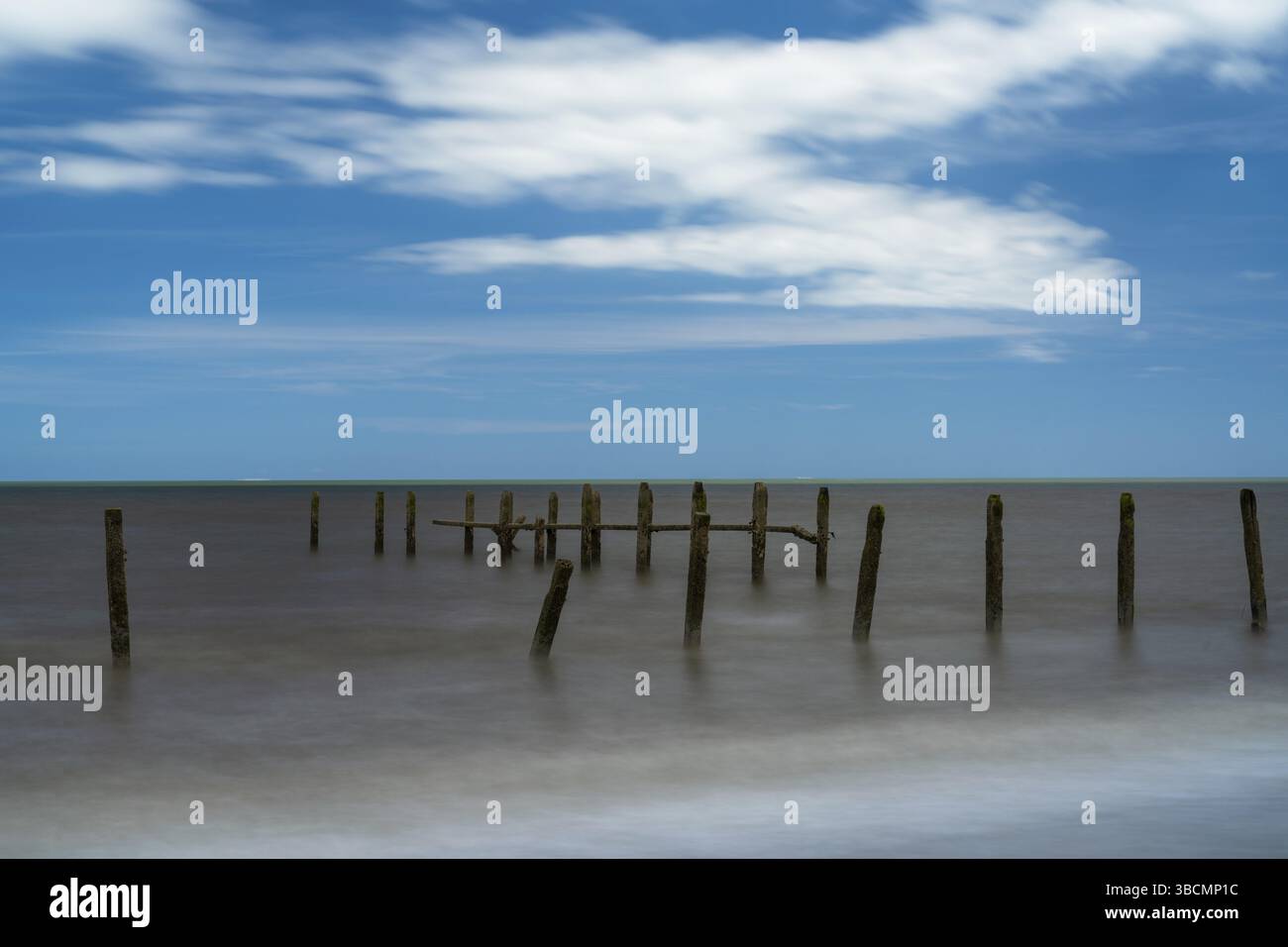 A long exposure view of old abandoned sea defenses on Happisburgh Beach ...