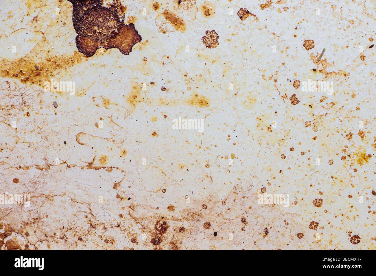 Texture of dirty stains and grease on white stove. Dried stains of fat ...