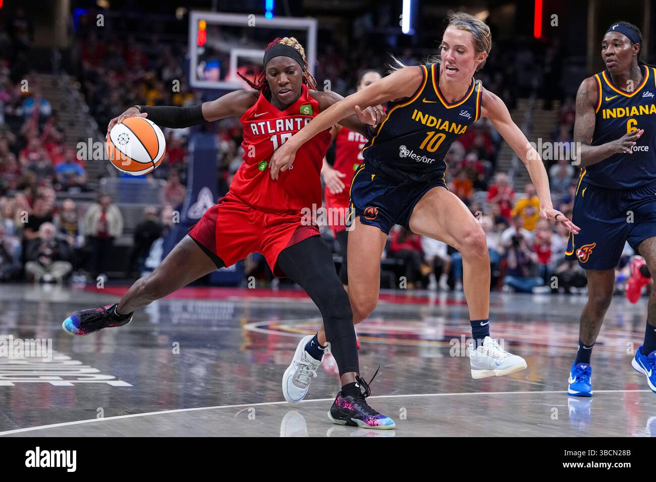Indiana Fever guard Lexie Hull (10) defends Atlanta Dream guard Rhyne ...