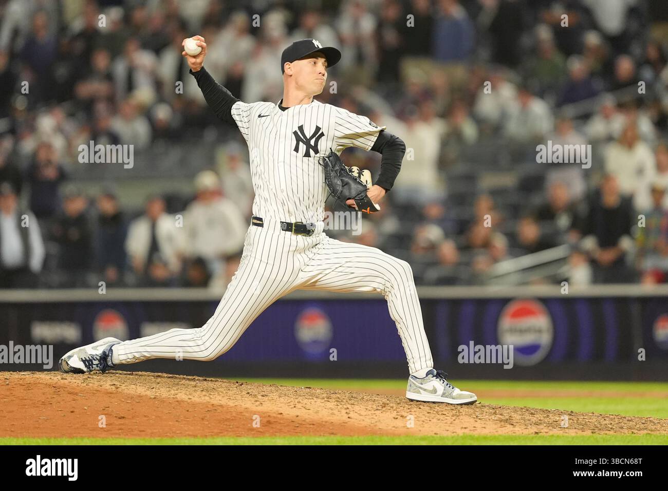 BRONX, NY - MAY 20: New York Yankees Pitcher Luke Weaver (30) delivers ...
