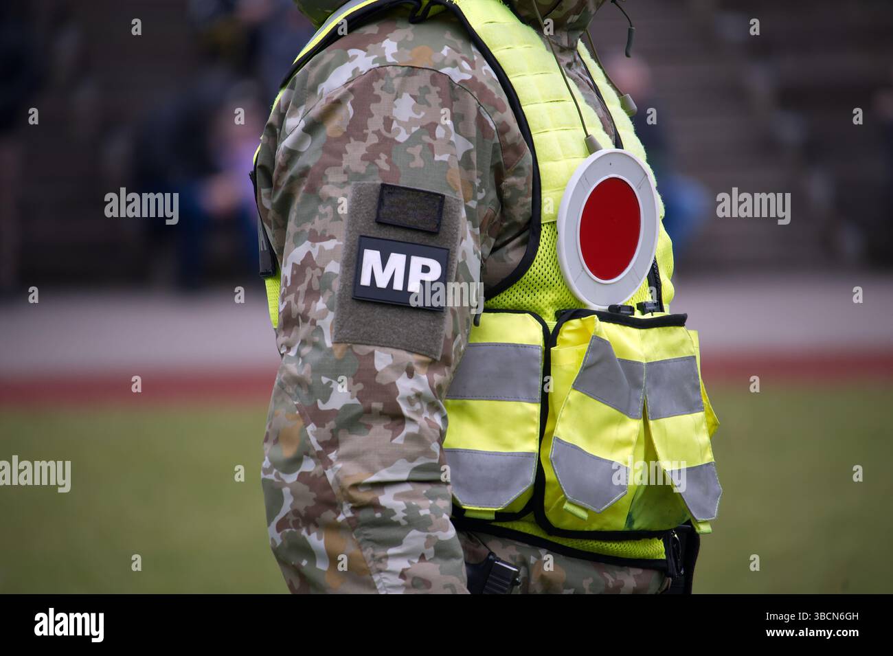 Close-up image of a military police officer wearing a camouflage ...