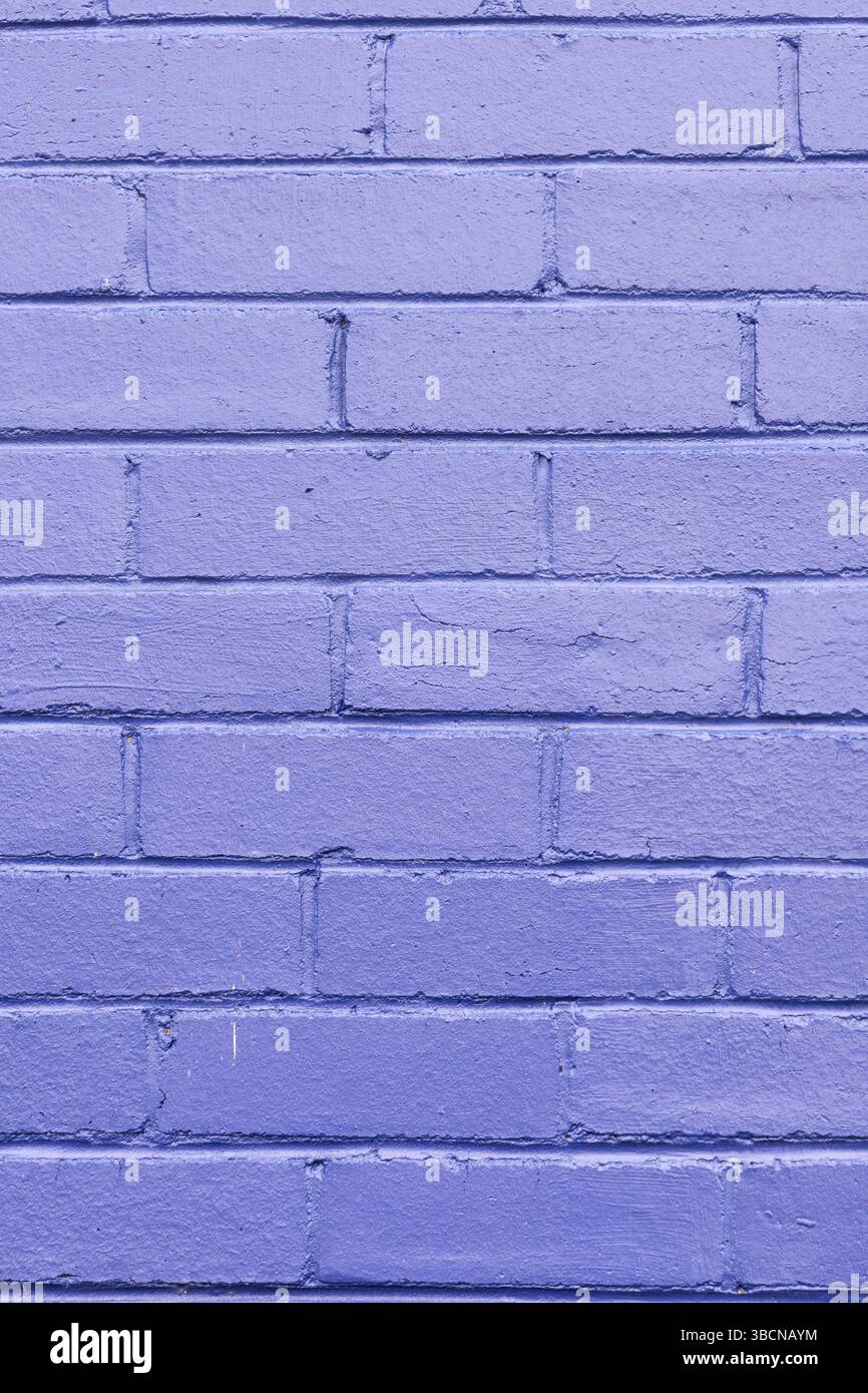 repeating pattern abstract of purple painted brick wall Stock Photo