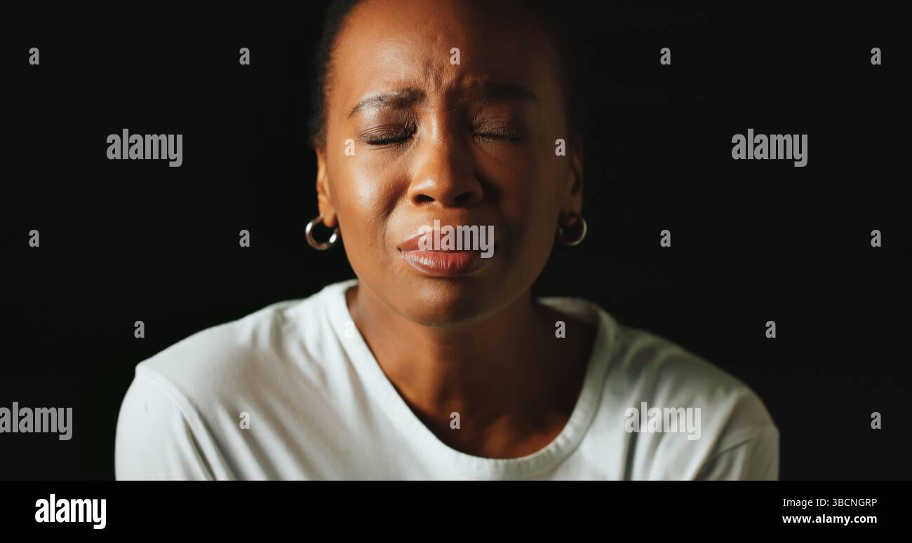 Woman crying eyes closed hi-res stock photography and images - Alamy