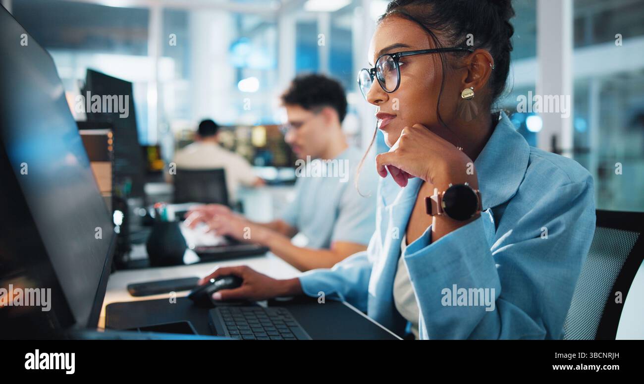 Computer, programmer and thinking with woman in office for game designer, coding idea and ux update. Software development, reflection and level Stock Photo