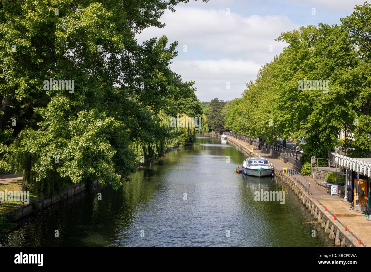 The river Wensum in Norwich with boat Stock Photo