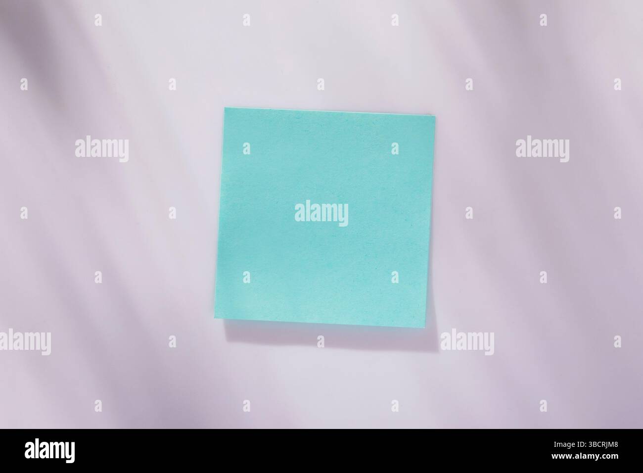 Turquoise Sticky Note Blank turquoise post it note on wall Stock Photo - Alamy