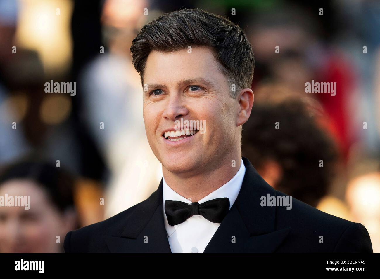 Colin Jost pose for photographers upon arrival at the premiere of the ...