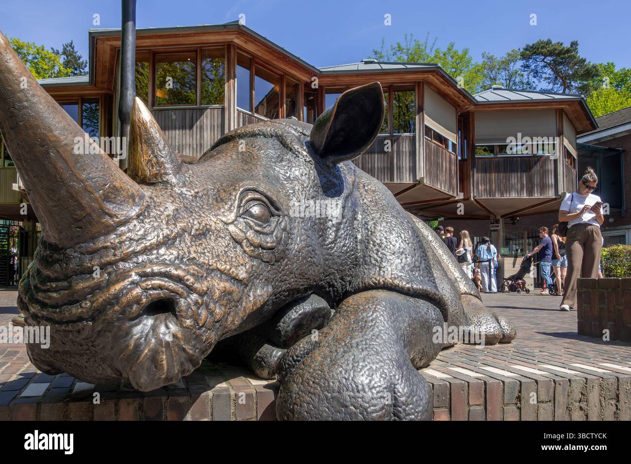 Bronze sculpture of rhinoceros at entrance of Burgers Zoo, zoological garden in Arnhem, Gelderland, Netherlands Stock Photo