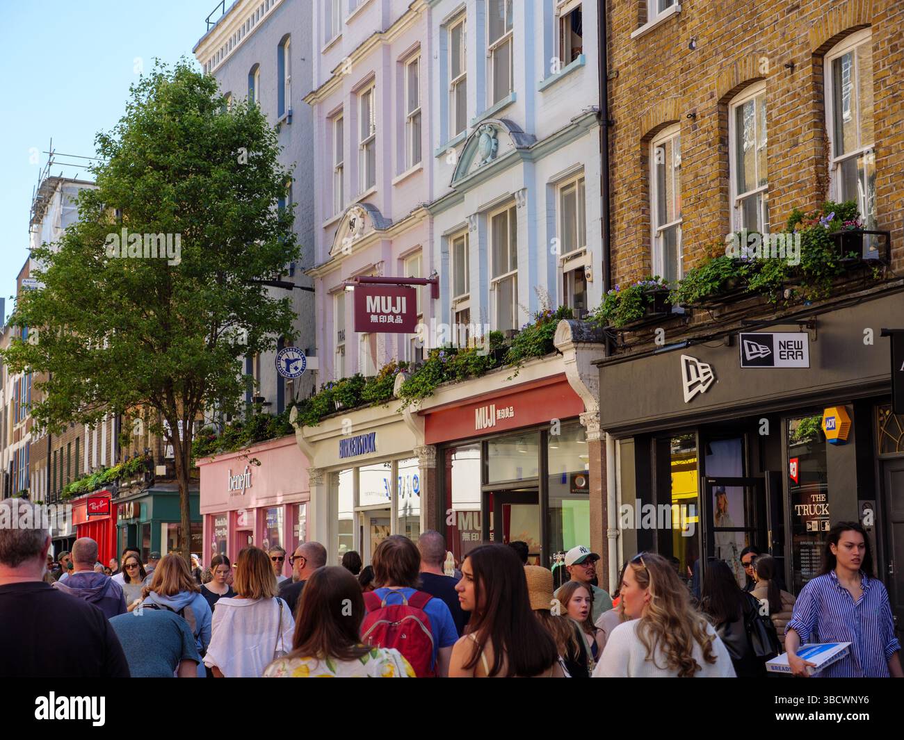 People in busy Carnaby Street in the West End, London, UK Stock Photo