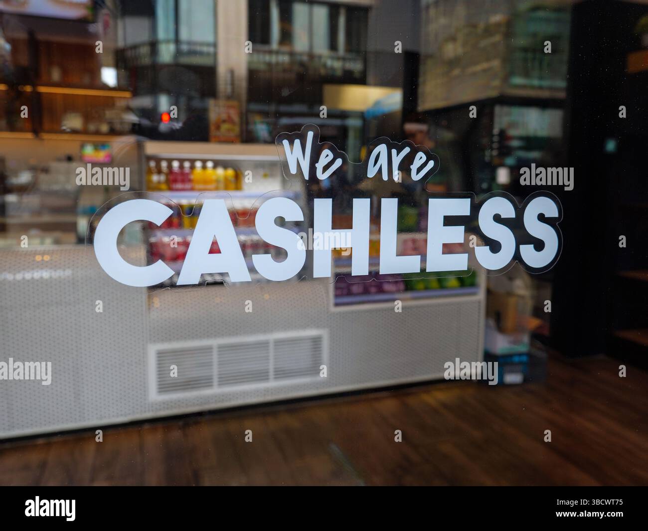 Cashless sign in takeaway food shop window, London, UK Stock Photo - Alamy