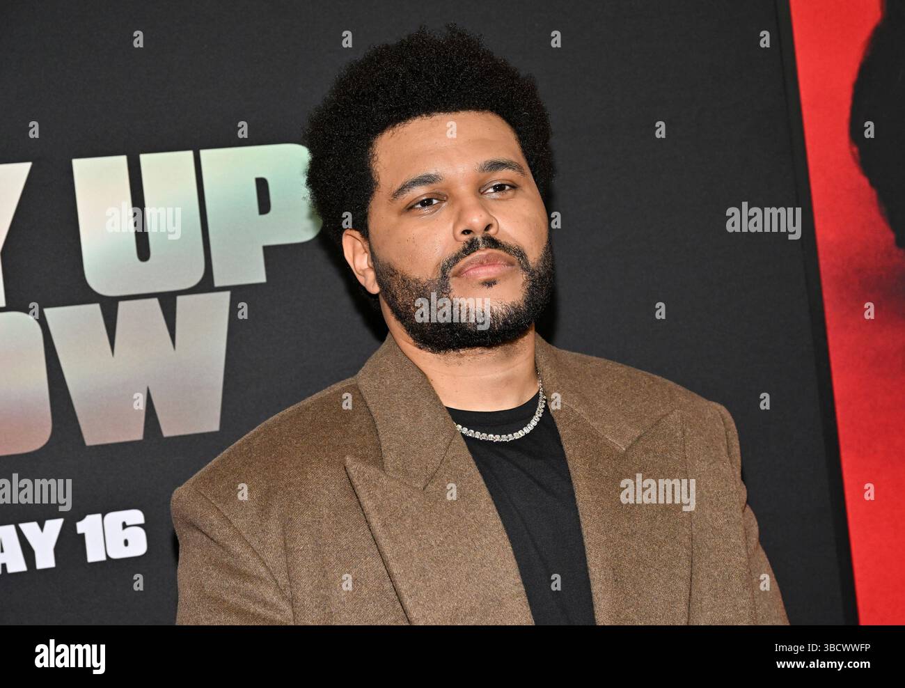 Abel Tesfaye (aka The Weeknd) attends the premiere of "Hurry Up