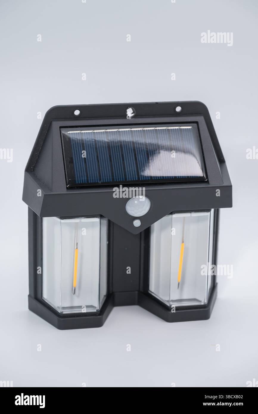 .Double solar wall lamp, outdoor, waterproof, motion sensor, powerful lighting Stock Photo