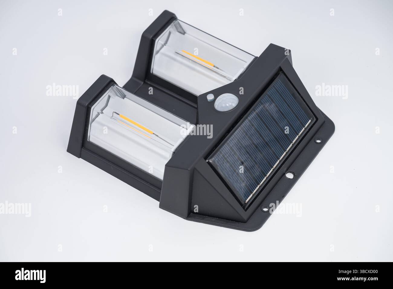 Double solar wall lamp, outdoor, waterproof, motion sensor, powerful lighting Stock Photo